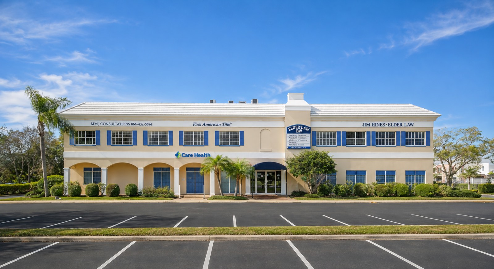 The Center Plaza Building, a two-story office building with blue shutters and an arcaded ground floor.